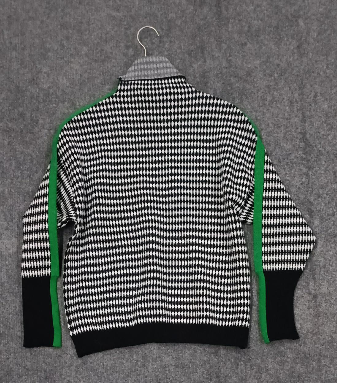 Green Striped Sweater with Black and White Plaid Pattern