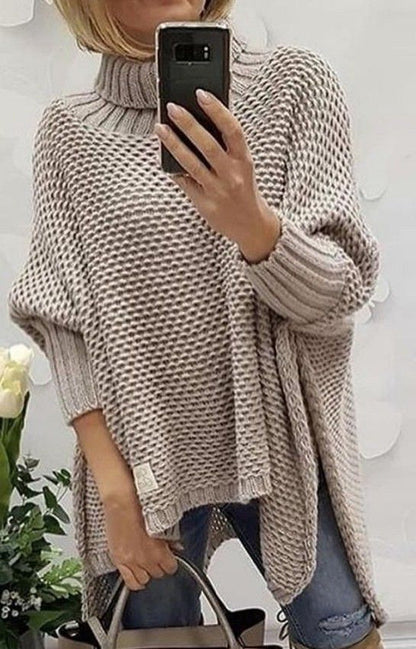Plain sweater in apricot color.